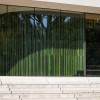 Gevelbekleding achter glas